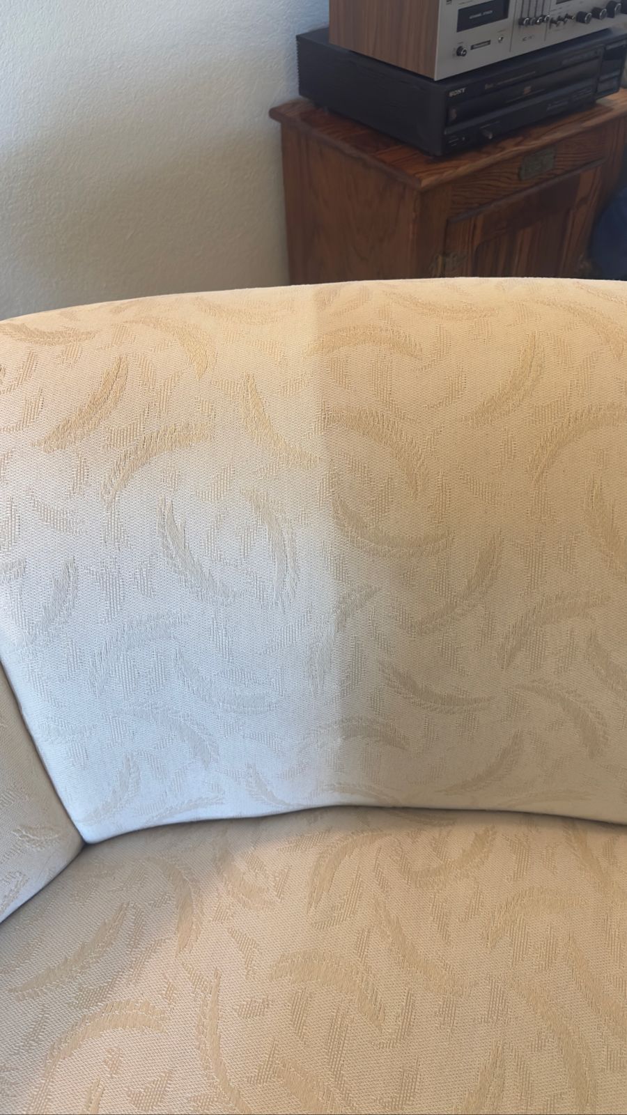 Fabric mid-clean showing the cleaning line