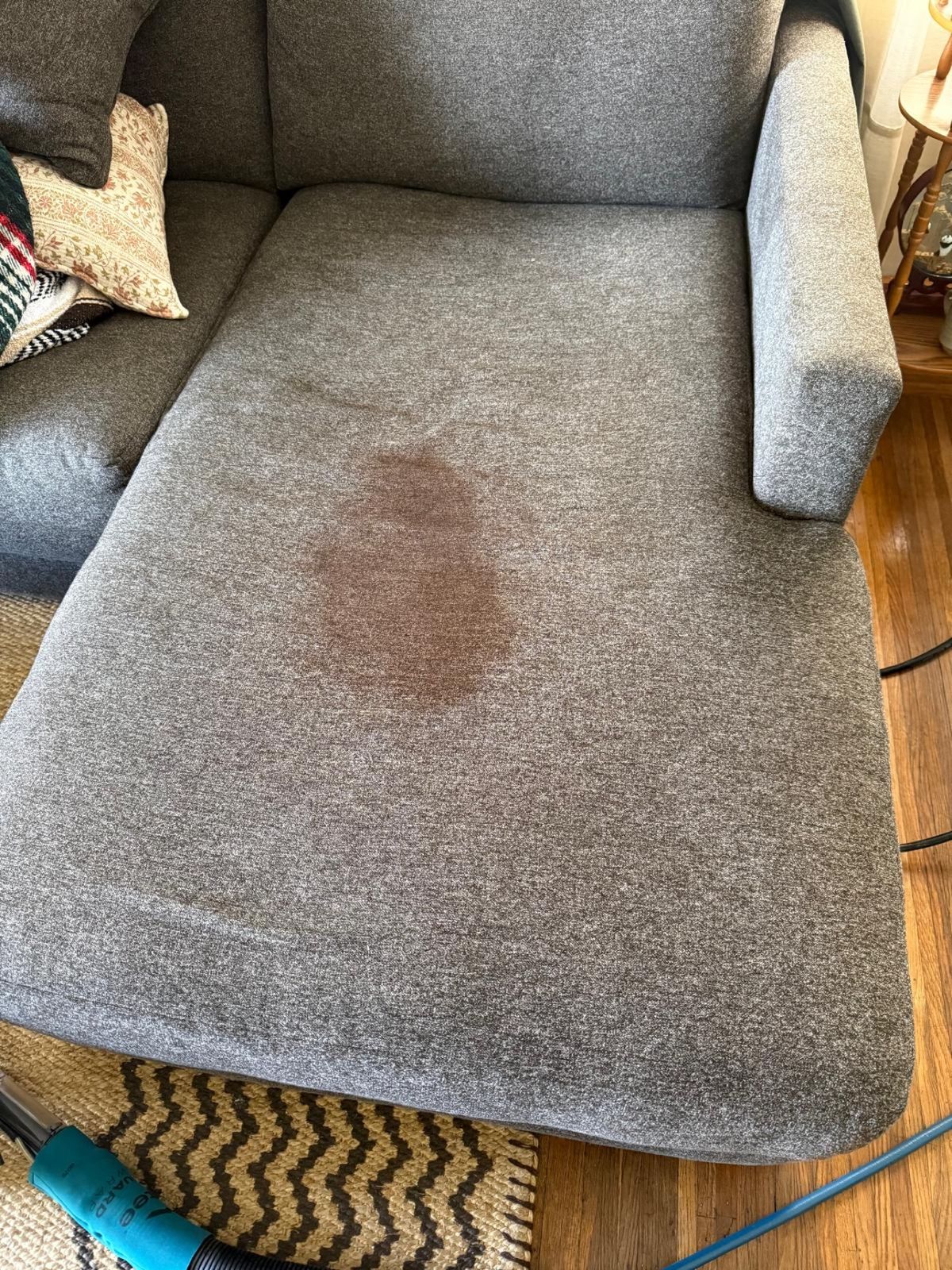 Gray chaise before cleaning